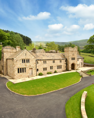 Picture of a large house in the countryside